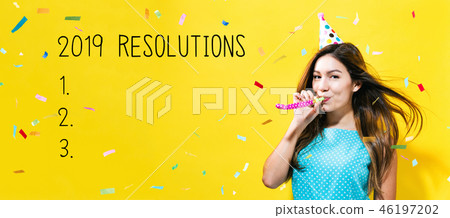 2019 Resolutions with young woman with party theme  2019 Resolutions with young woman with party theme  46197202