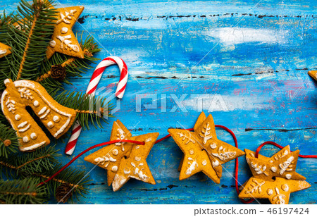 Christmas cookies in shape of festive symbols Christmas cookies in shape of festive symbols 46197424
