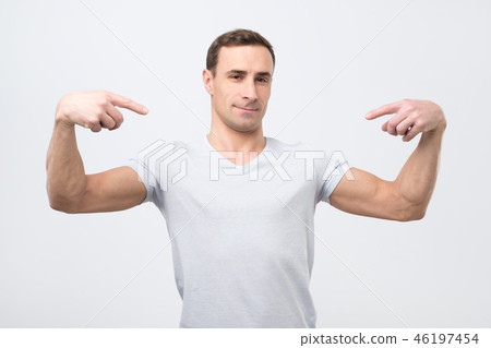 Italian man in white t-shirt, standing Italian man in white t-shirt, standing 46197454