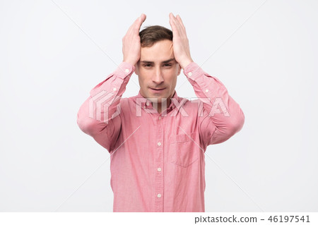 man on pink shirt with hysterical expression man on pink shirt with hysterical expression 46197541