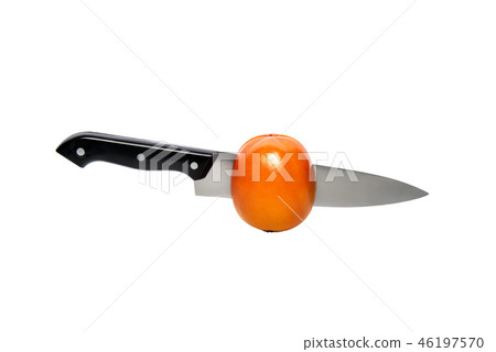 Persimmon wirh knife inside, cut in half. Isolated on a white background, with clipping path Persimmon wirh knife inside, cut in half. Isolated on a white background, with clipping path 46197570
