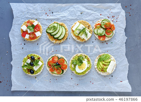Assorted tasty appetizers with fresh vegetables 46197866