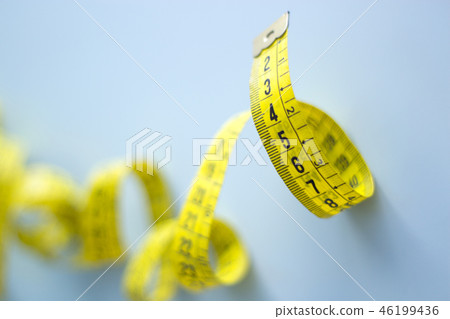 Yellow tape measure rolled Yellow tape measure rolled 46199436