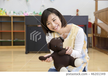 Mr. Hobo playing with a toy and a bear plush Mr. Hobo playing with a toy and a bear plush 46201349