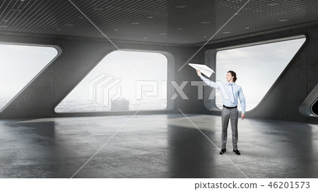 Businessman in modern interior Businessman in modern interior 46201573