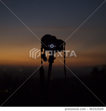 Camera facing the colorful horizon at nightfall Camera facing the colorful horizon at nightfall 46202689