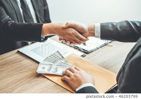 Corruption concept,Business man passing money Corruption concept,Business man passing money 46203799