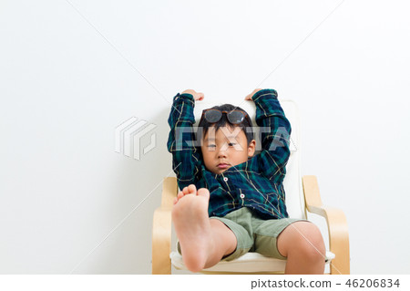 A boy wearing eyeglasses A boy wearing eyeglasses 46206834