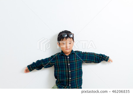 A boy wearing eyeglasses 46206835