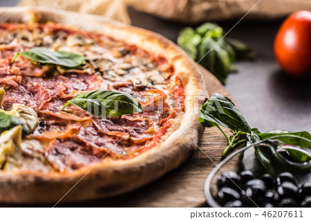 Pizza Quatro Stagioni traditional italian meal. 46207611