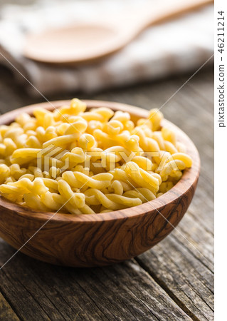 Uncooked gemelli pasta. Uncooked gemelli pasta. 46211214