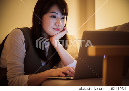 Woman personal computer night late night young woman cute 46211984
