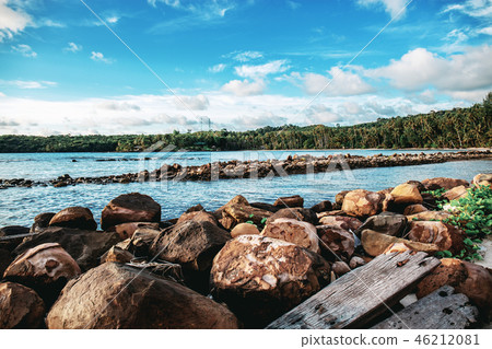 Stone on beach with sky. 46212081