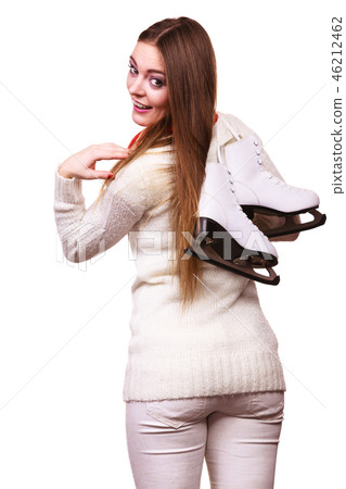 Smiling woman with ice skates Smiling woman with ice skates 46212462