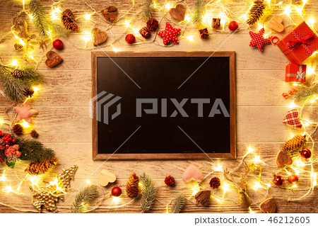 Christmas lights on wooded background Christmas lights on wooded background 46212605