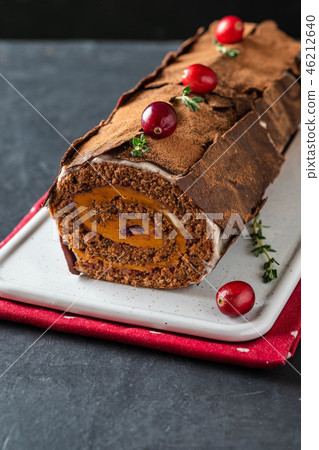 Buche de Noel. Traditional Christmas dessert, Christmas yule log cake with chocolate cream Buche de Noel. Traditional Christmas dessert, Christmas yule log cake with chocolate cream 46212640