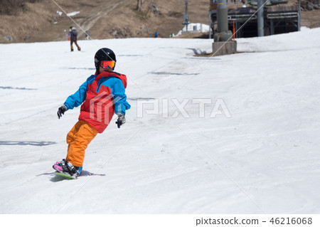 Children playing snowboarding 46216068