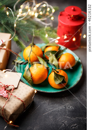 Top view of a table with tangerines, candles 46216182