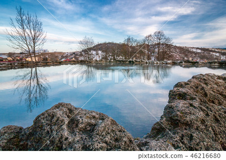 Travertine lake with hot water. 46216680