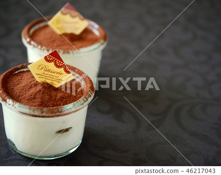 Cup tiramisu black background (copy space) Cup tiramisu black background (copy space) 46217043