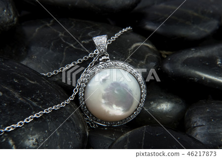 Gold pendant with Nacre and diamonds on black Gold pendant with Nacre and diamonds on black 46217873