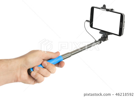 Hand and smartphone with selfie stick Hand and smartphone with selfie stick 46218592