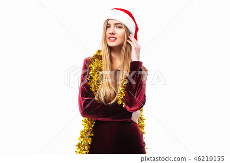 Happy woman in santa hat and dress Happy woman in santa hat and dress 46219155