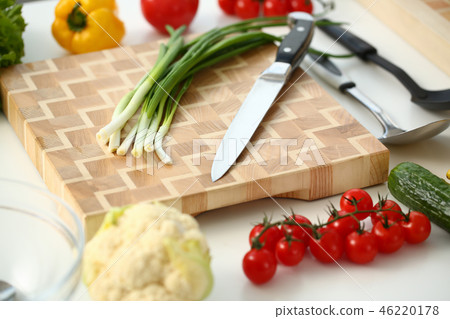 Knife and green onions for salad or fresh 46220178