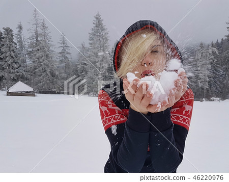 Happy winter time. Well dressed enjoying the winter Happy winter time. Well dressed enjoying the winter 46220976