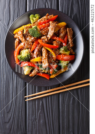 Asian teriyaki beef with red and yellow peppers Asian teriyaki beef with red and yellow peppers 46222572