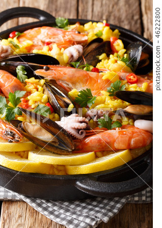 Closeup of traditional Spanish paella with seafood Closeup of traditional Spanish paella with seafood 46222800