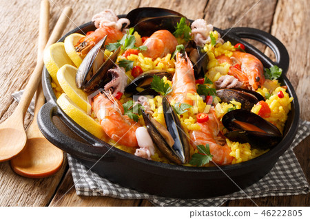 Spanish spicy paella seafood with king prawns 46222805