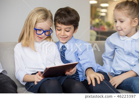 Little children on business meeting working and sharing ideas in office. 46223397