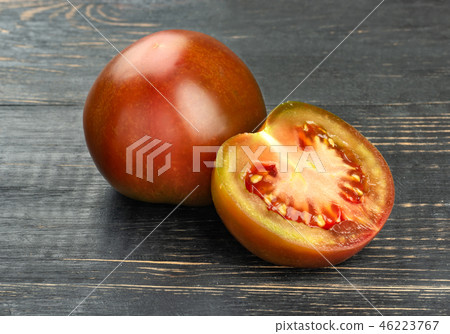 Tomato kumato with half Tomato kumato with half 46223767