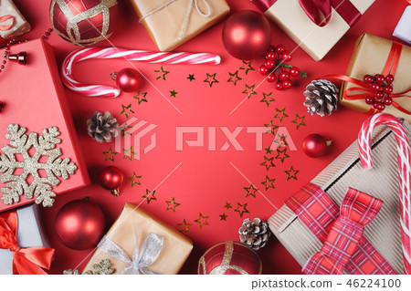 Christmas presents and accessories on red. Christmas presents and accessories on red. 46224100