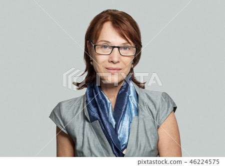 Portrait of mature business woman in blue scarf 46224575
