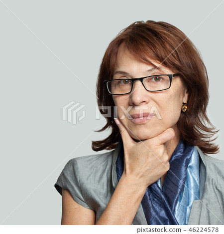 Pensive business woman in glasses thinking Pensive business woman in glasses thinking 46224578