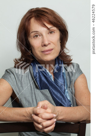 Mid adult woman face, portrait 46224579