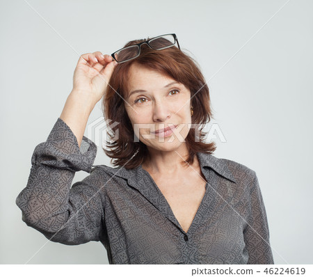 Cute mature business woman with glasses Cute mature business woman with glasses 46224619