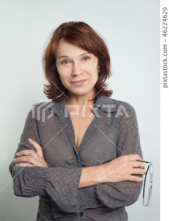Mid adult woman businesswoman smiling Mid adult woman businesswoman smiling 46224620