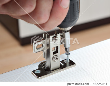 installation of door hinges, screws screwed installation of door hinges, screws screwed 46225031