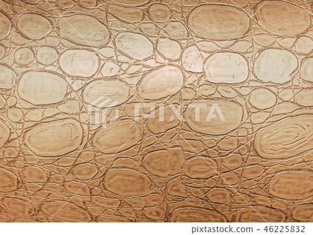 Artificial crocodile or python golden skin texture background. Artificial crocodile or python golden skin texture background. 46225832
