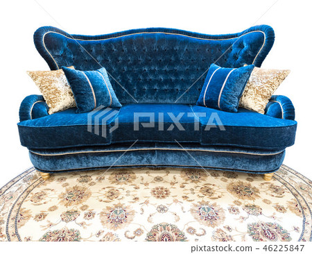 Blue velours sofa with pillows. Soft luxury classical couch with cushions isolated background Blue velours sofa with pillows. Soft luxury classical couch with cushions isolated background 46225847