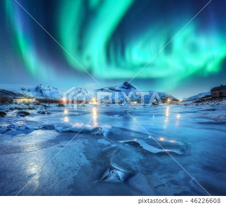 Northern lights above snowy mountains, frozen sea Northern lights above snowy mountains, frozen sea 46226608