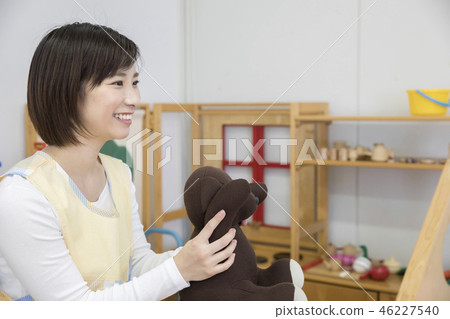 Mr. Hobo playing with a toy and a bear plush 46227540