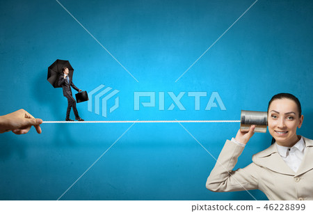 Woman using deaf phone 46228899