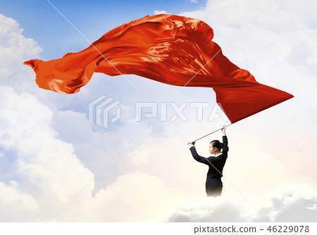 Woman waving red flag Woman waving red flag 46229078