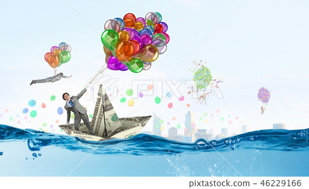 Humorous guy with balloons Humorous guy with balloons 46229166