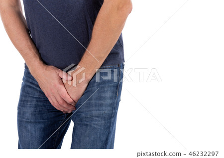 Man holding his urethra in pain. Men problems 46232297