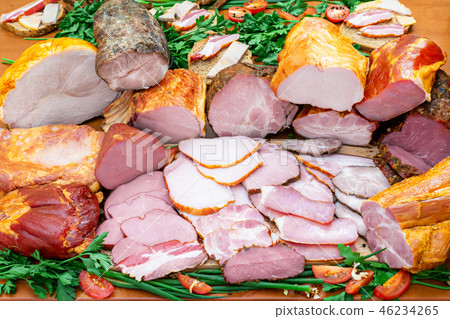 Assorted meat products including ham and sausages 46234265